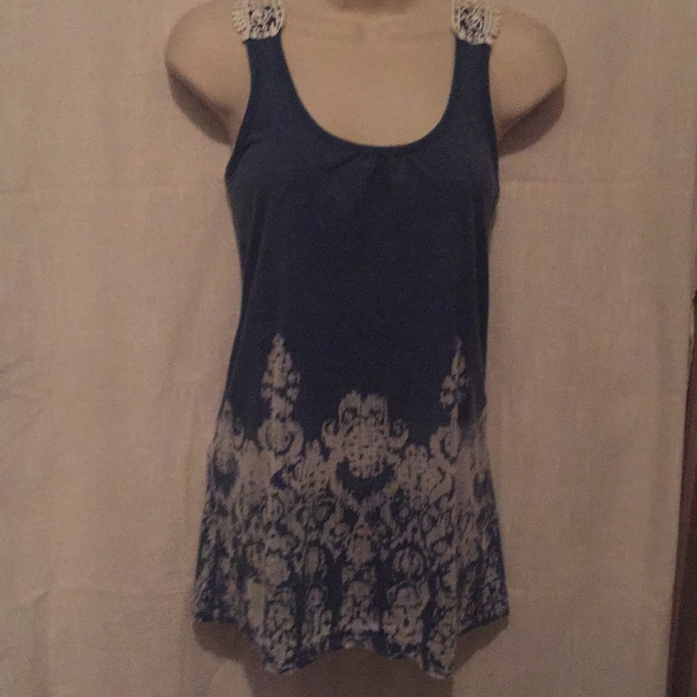 Polyester/cotton top.  Lace insert